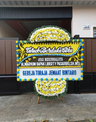 Papan Bunga Duka di Kumbe
