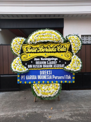 Papan Bunga Duka di Kumbe